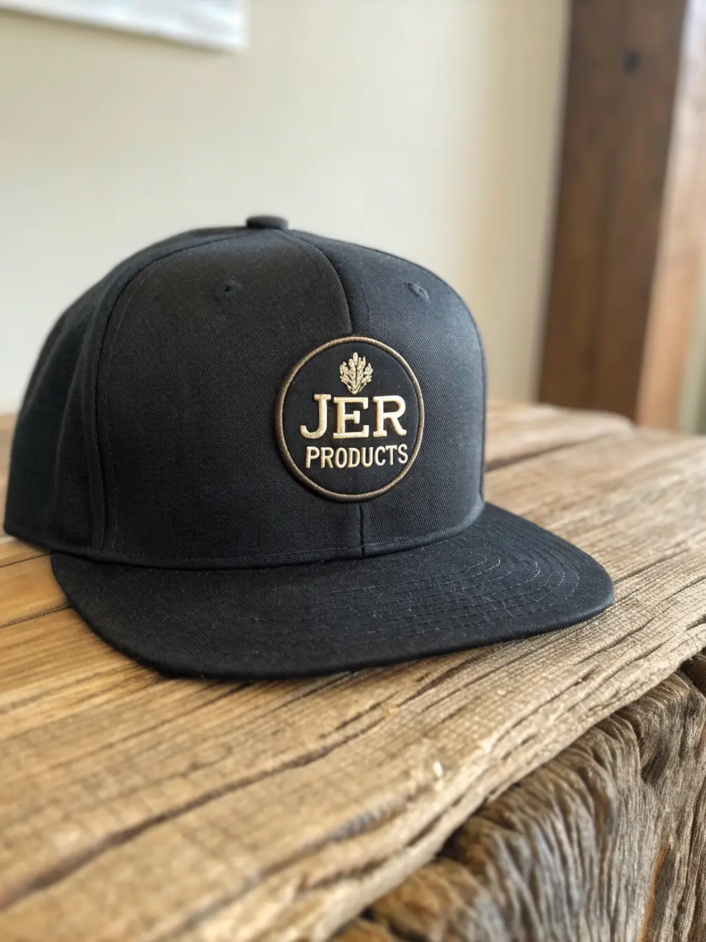 A stylish snapback hat made from premium wool blend, featuring a bold, modern design and a flat brim, suitable for a trendy corporate look.